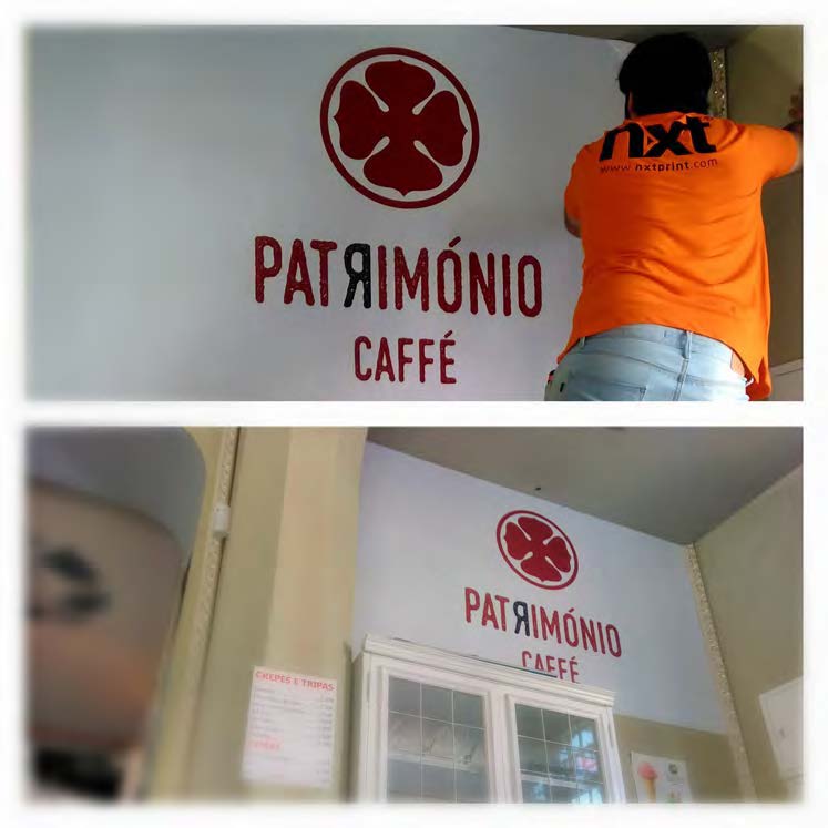 Aplicação de vinil recortado numa montra